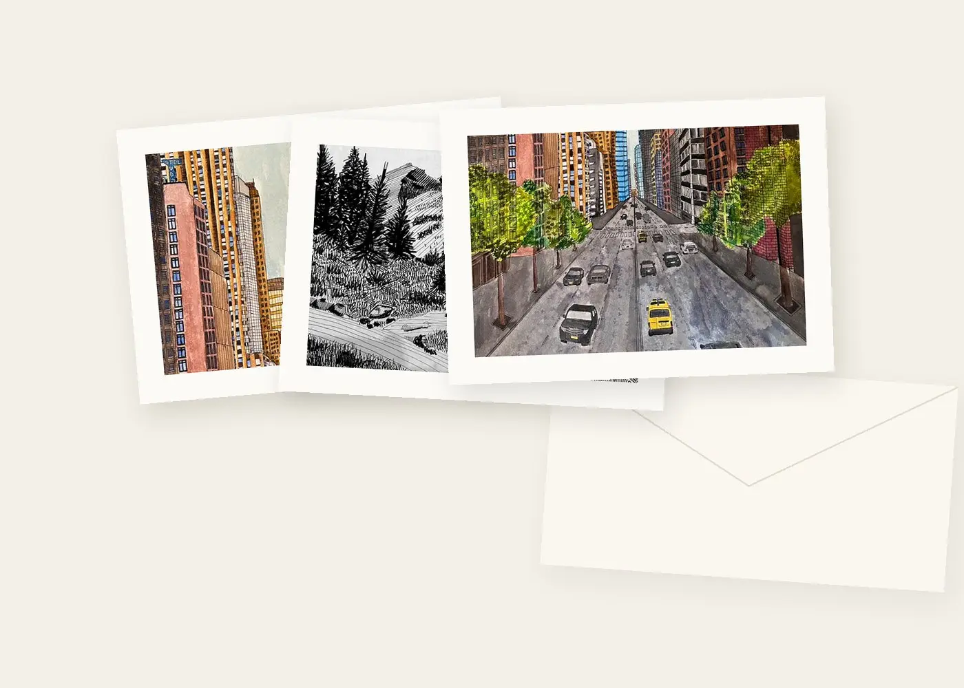 A fan of 5 × 7 notecards with an envelope